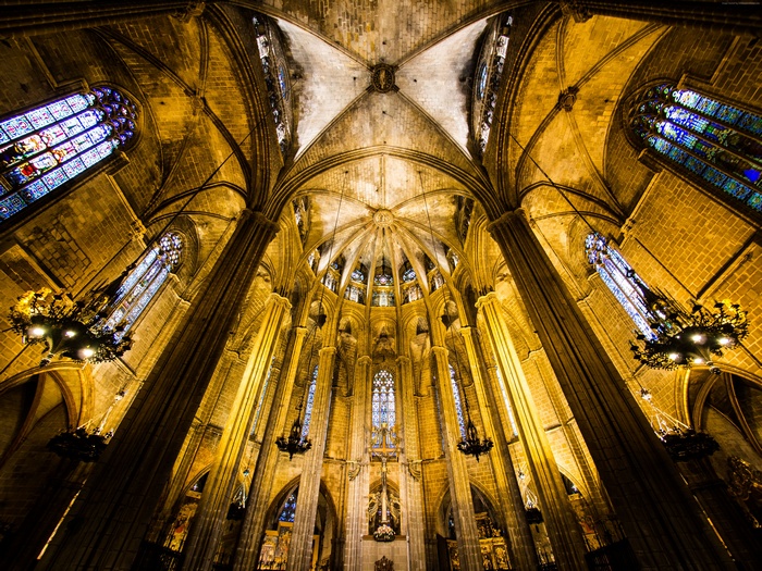 Interior of Barcelona Cathedral with stained glass windows