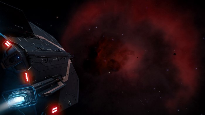 Elite Dangerous spaceship in a red nebula