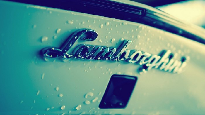 Lamborghini car emblem with water drops