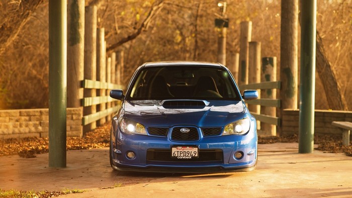 Blue Subaru Impreza WRX STI parked outdoors