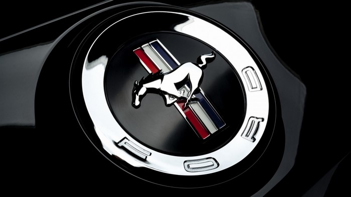 Ford Mustang emblem on a black car