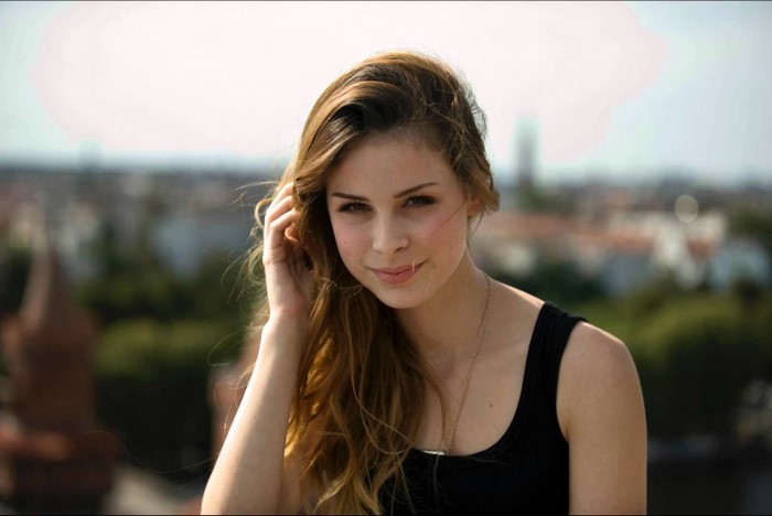 Lena Meyer Landrut portrait with city background