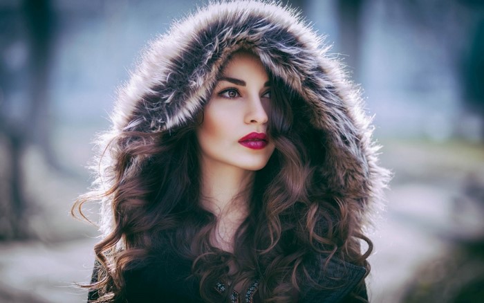 Portrait of Woman with Auburn Hair and Fur Hood