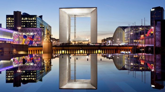 La Défense Grande Arche and cityscape reflection at night