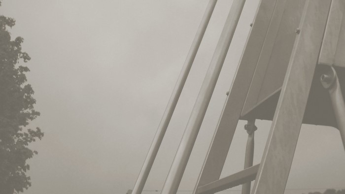 White structure against a foggy sky