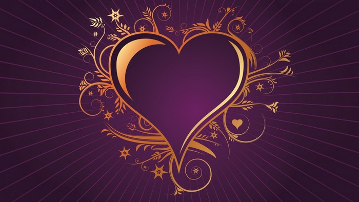 Golden heart with floral ornaments on purple background