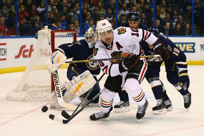 Hockey Players in Action Near Goal