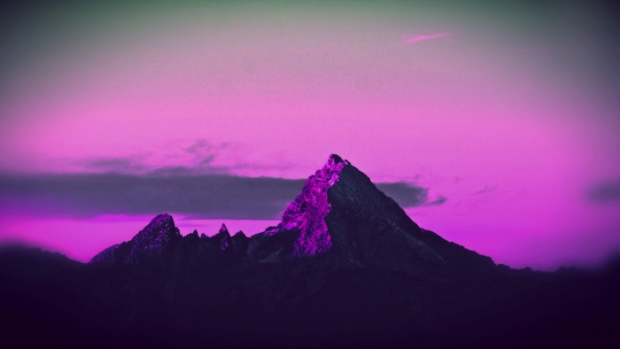 Mountains at sunset with purple sky