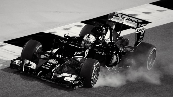 Formula 1 race car with driver on track