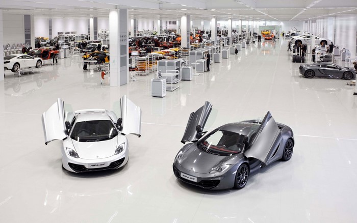 McLaren MP4-12C sports cars in a factory