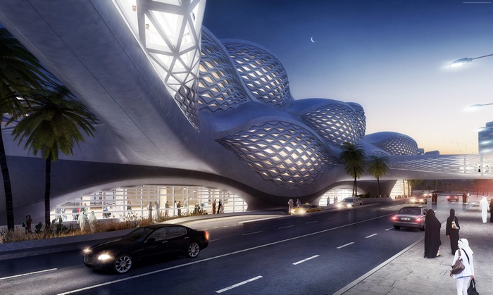 Futuristic building with cars and people on a street