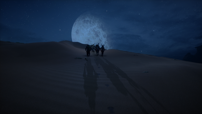 Dragon Age Inquisition: A group walks across sand dunes under a large moon.