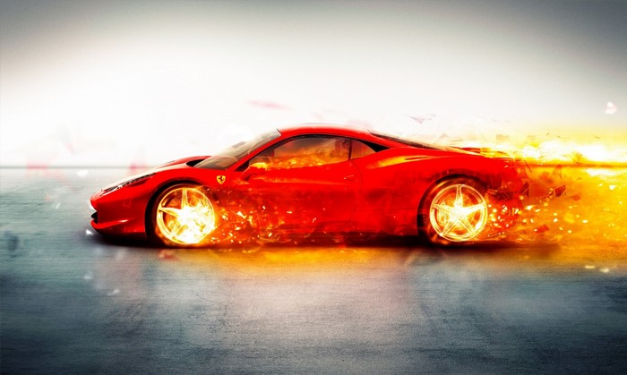 Red Ferrari 458 with fiery wheels on a road