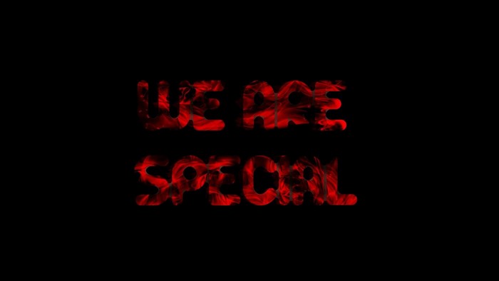 WE ARE SPECIAL text with red smoke effect