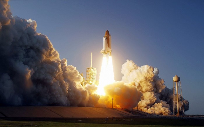 Space Shuttle Launch with Smoke Plumes