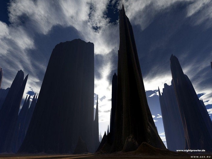 Dark spires against a cloudy sky