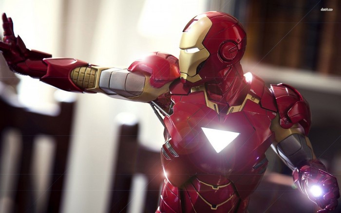 Iron Man action figure with glowing chest and hand