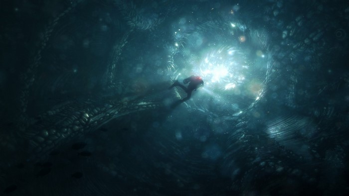 Scuba diver in a dark, alien underwater environment