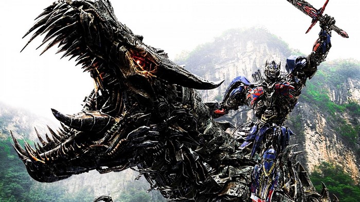 Optimus Prime riding a dinosaur Transformer