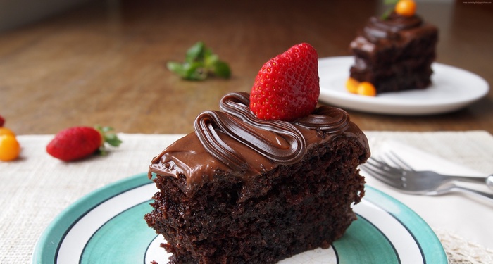 Chocolate cake with strawberry and chocolate frosting
