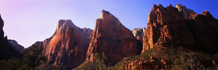Red rock mountains under a clear blue sky