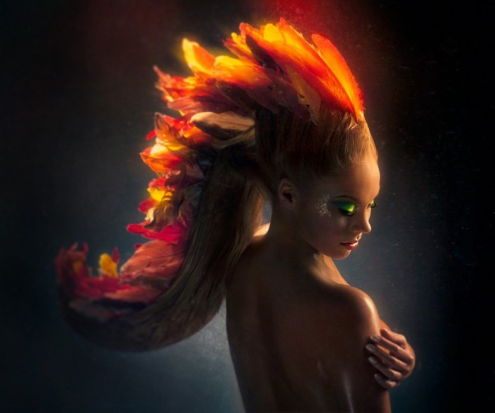 Woman with fiery hair and makeup