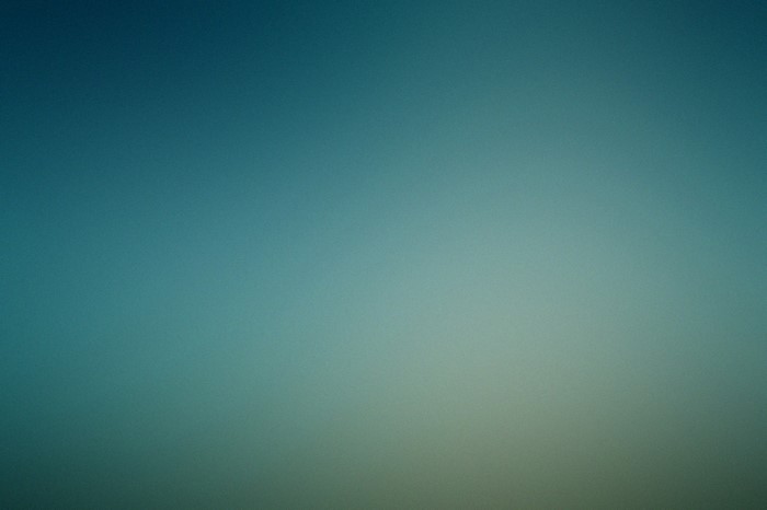 Blue and green gradient with subtle texture