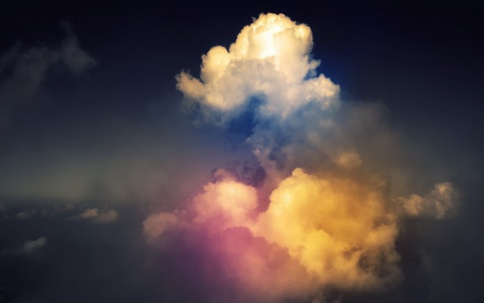 Sunlight illuminating colorful clouds in the sky