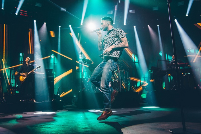 Adam Levine performing with Maroon 5