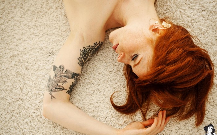 AnnaLee Suicide redhead model portrait tattoo lying down