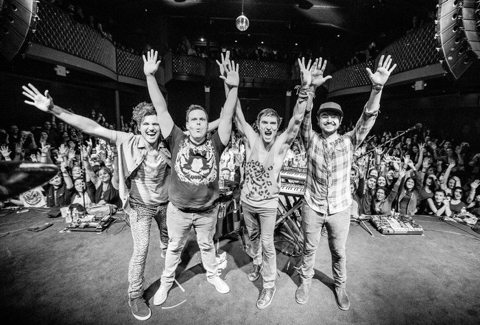 Walk the Moon band performing live on stage