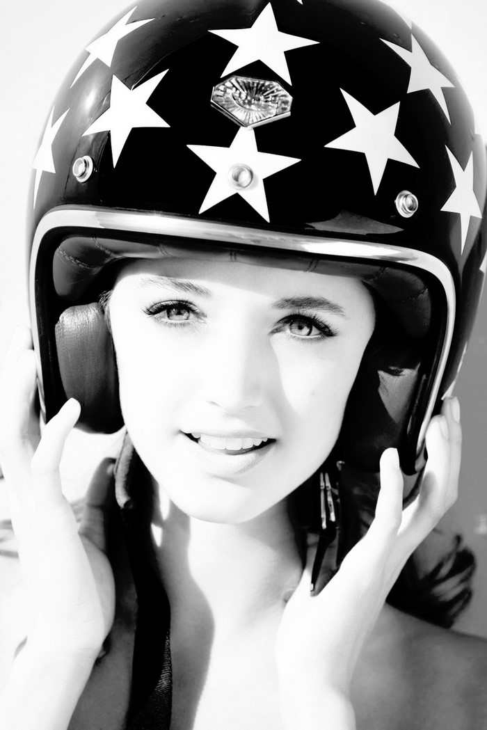 Alyssa Arce wearing a star-patterned helmet