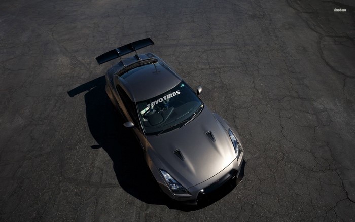 Nissan GT-R with large rear wing and Toyo Tires banner