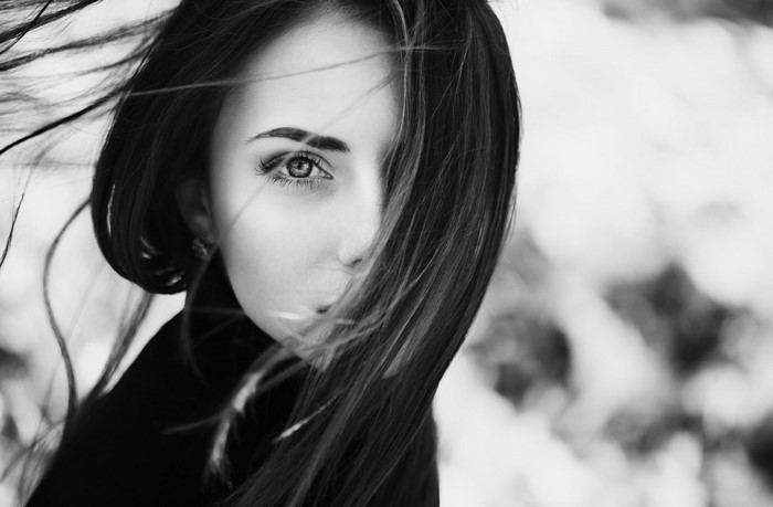 Monochrome portrait of a woman with long hair