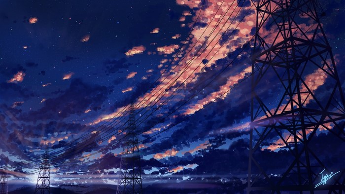 Power lines and towers against a twilight sky with clouds
