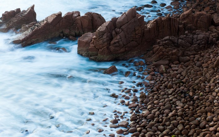 Rocky coast with waves crashing on shore