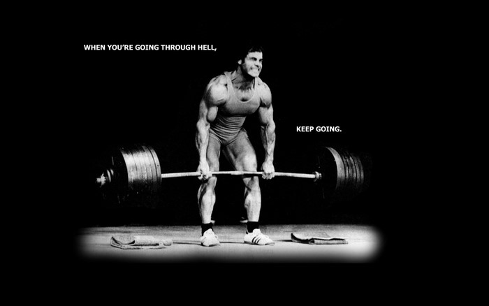 Bodybuilder lifting weights with motivational text