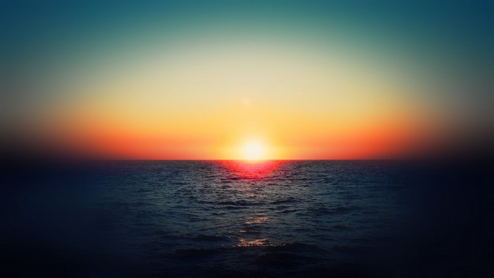 Sunset over the ocean with colorful sky