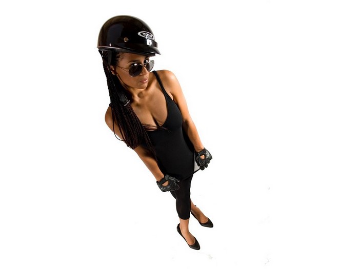 Woman in helmet and sunglasses