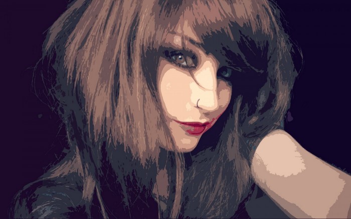 Woman with brown hair and red lipstick