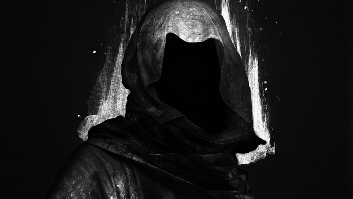 Faceless Hooded Figure in Dark Monochrome