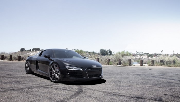 Black Audi R8 sports car parked on asphalt