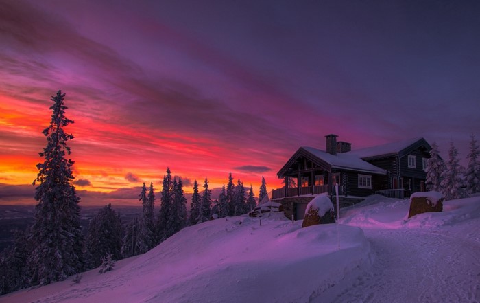 Snowy Evening Sunset Over Norwegian Mountain Cottage