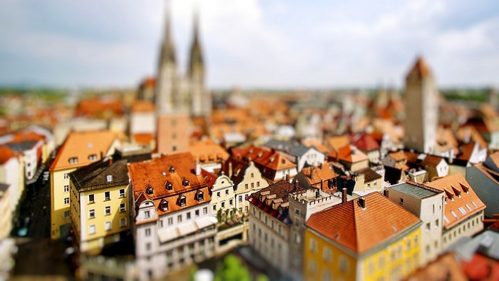 Tilt shift cityscape of European town with cathedrals