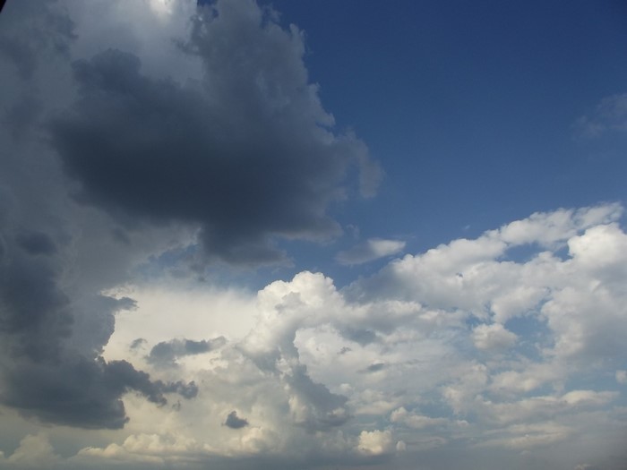 Dark and light clouds in a blue sky