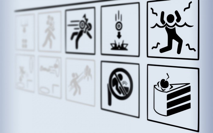 Portal game icons with cake and danger symbols