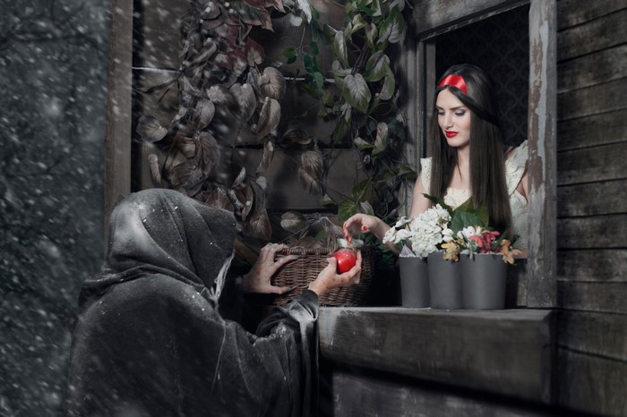 Snow White and the Evil Queen with poisoned apple