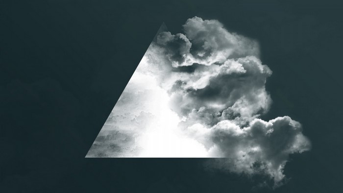 Monochrome triangle with clouds and sunlight