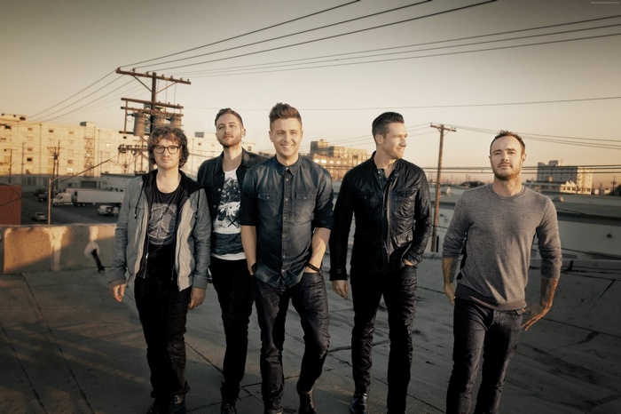 OneRepublic band members on a rooftop