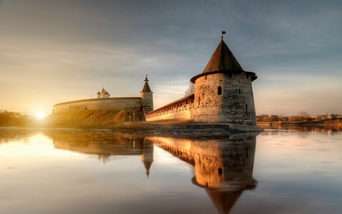 Pskov Kremlin fortress on the river at sunrise